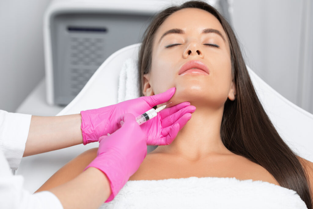 Woman receiving Botox injections to her jaw to help alleviate jaw clenching issues